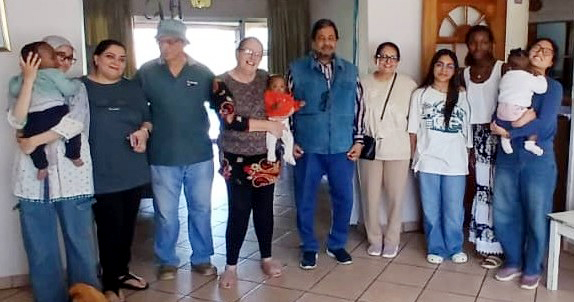 Gerry & Robyn with the Honourable Mr & Mrs Ashraf of the right and their family and friends