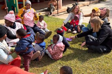 Beyond Survival team & our aunties, playing with our babies